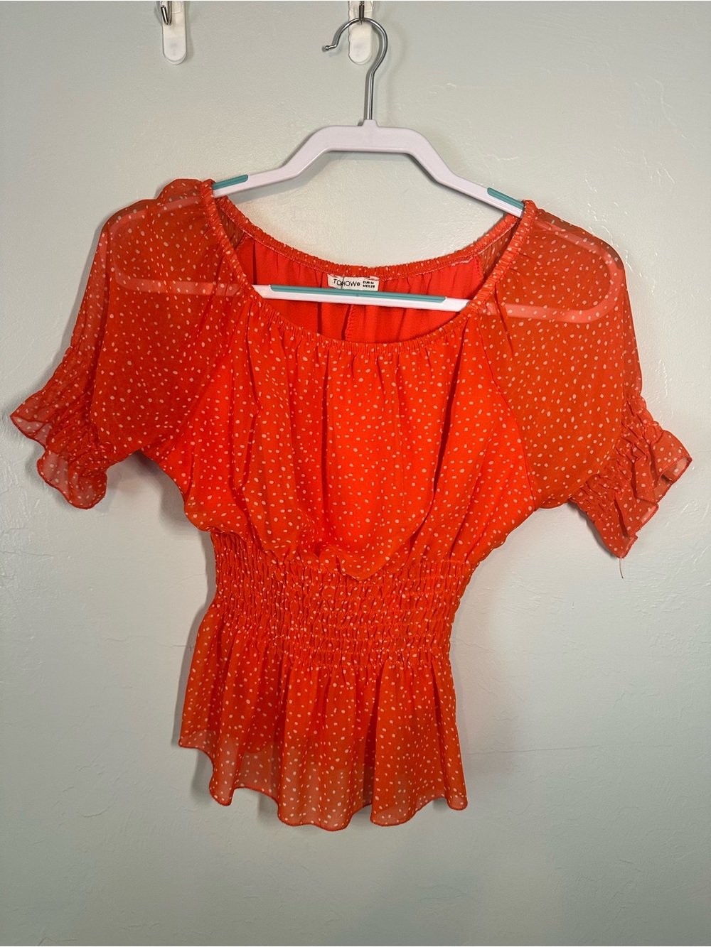 Orange Dot Peplum Smocked Blouse